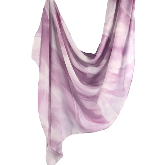Lightweight cotton-modal hijab in a lavender and blush blend, softly printed with elegant flow, ideal for modest and feminine styling.
